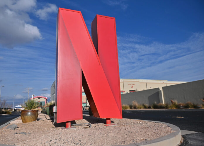 Netflix plans to reduce expenditures by about $300 million